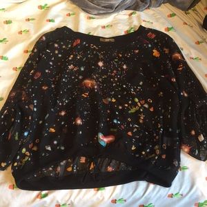 Space themed flowy shirt.